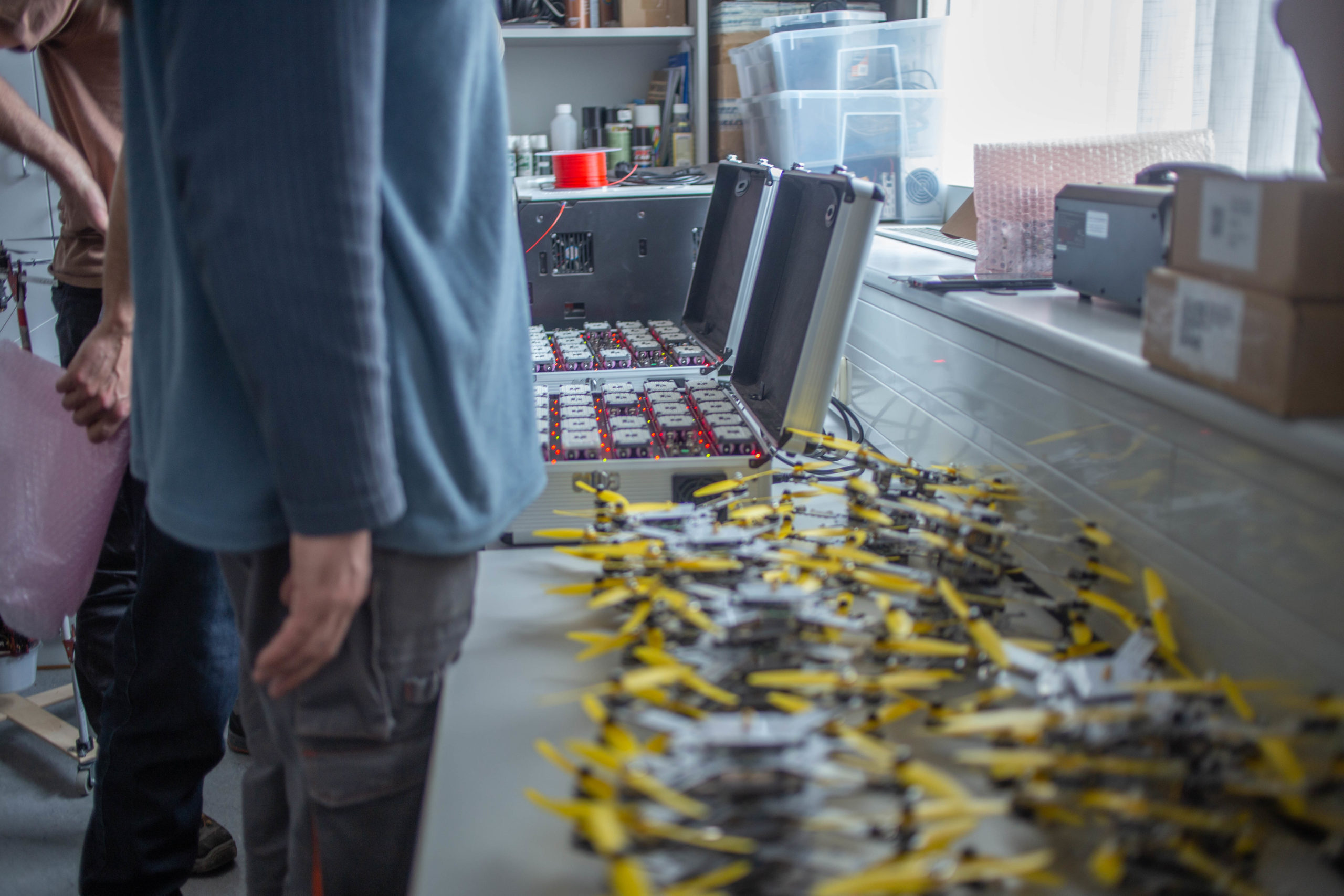 LuminousBees team preparing drones for test flights in Budapest